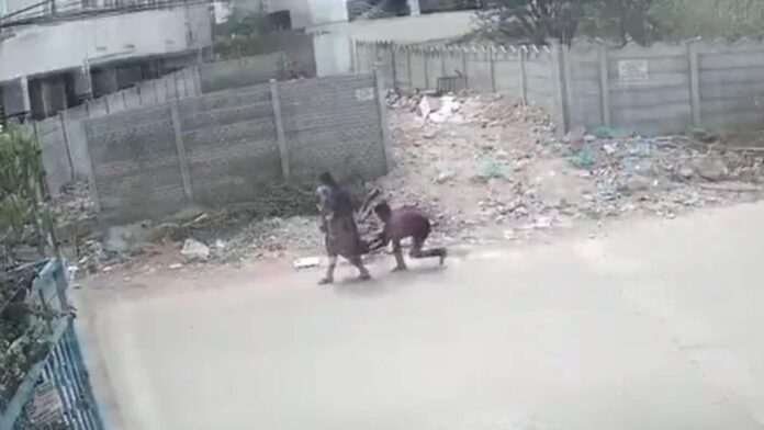 c1ssgp14_hyderabad-teen-lifts-womans-dress_625x300_20_May_26.jpg